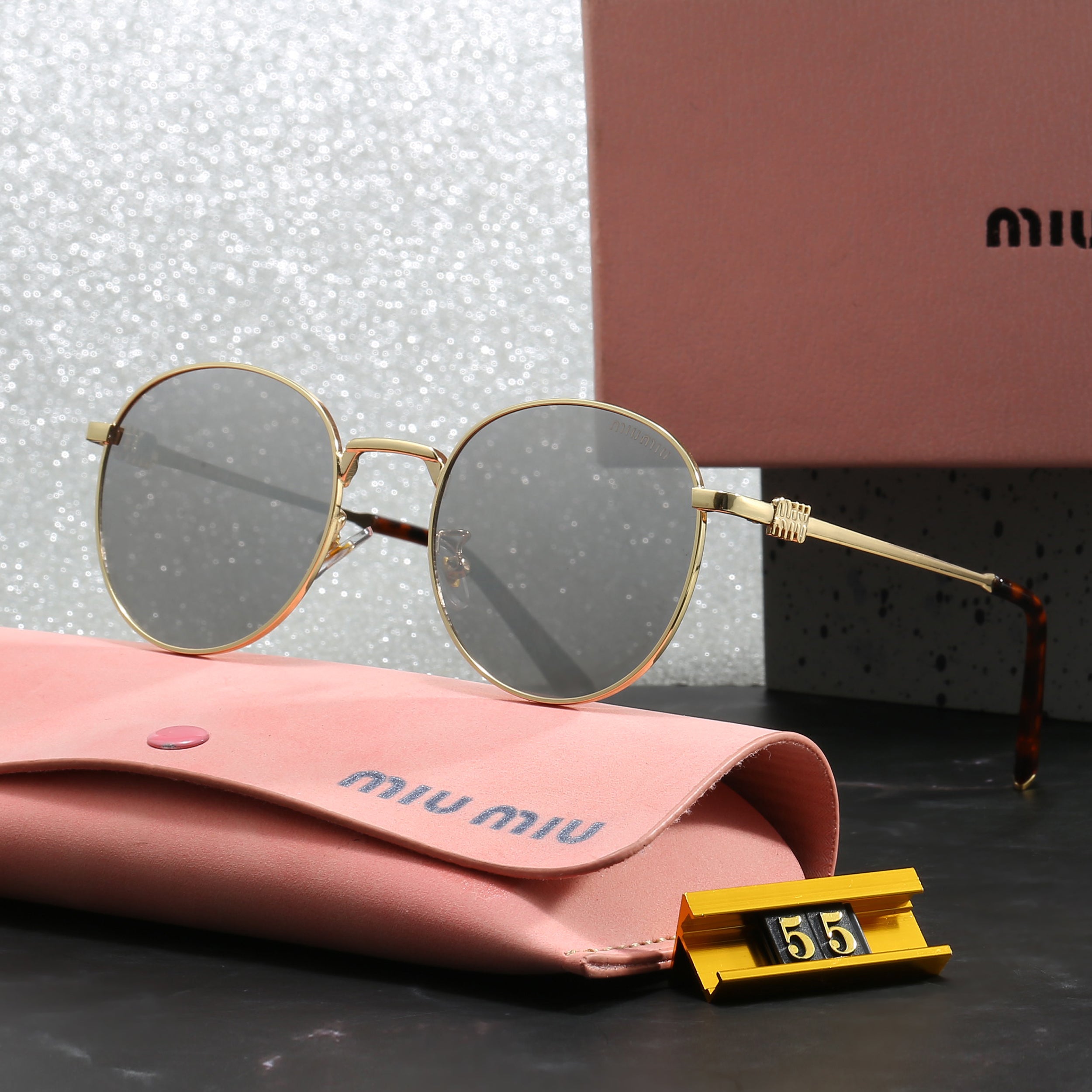 Miu Miu Round Sunglasses